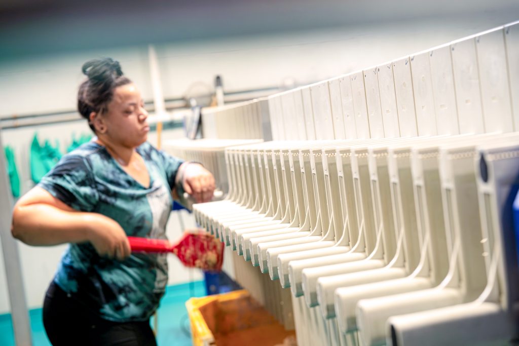 Person working on the mash filter